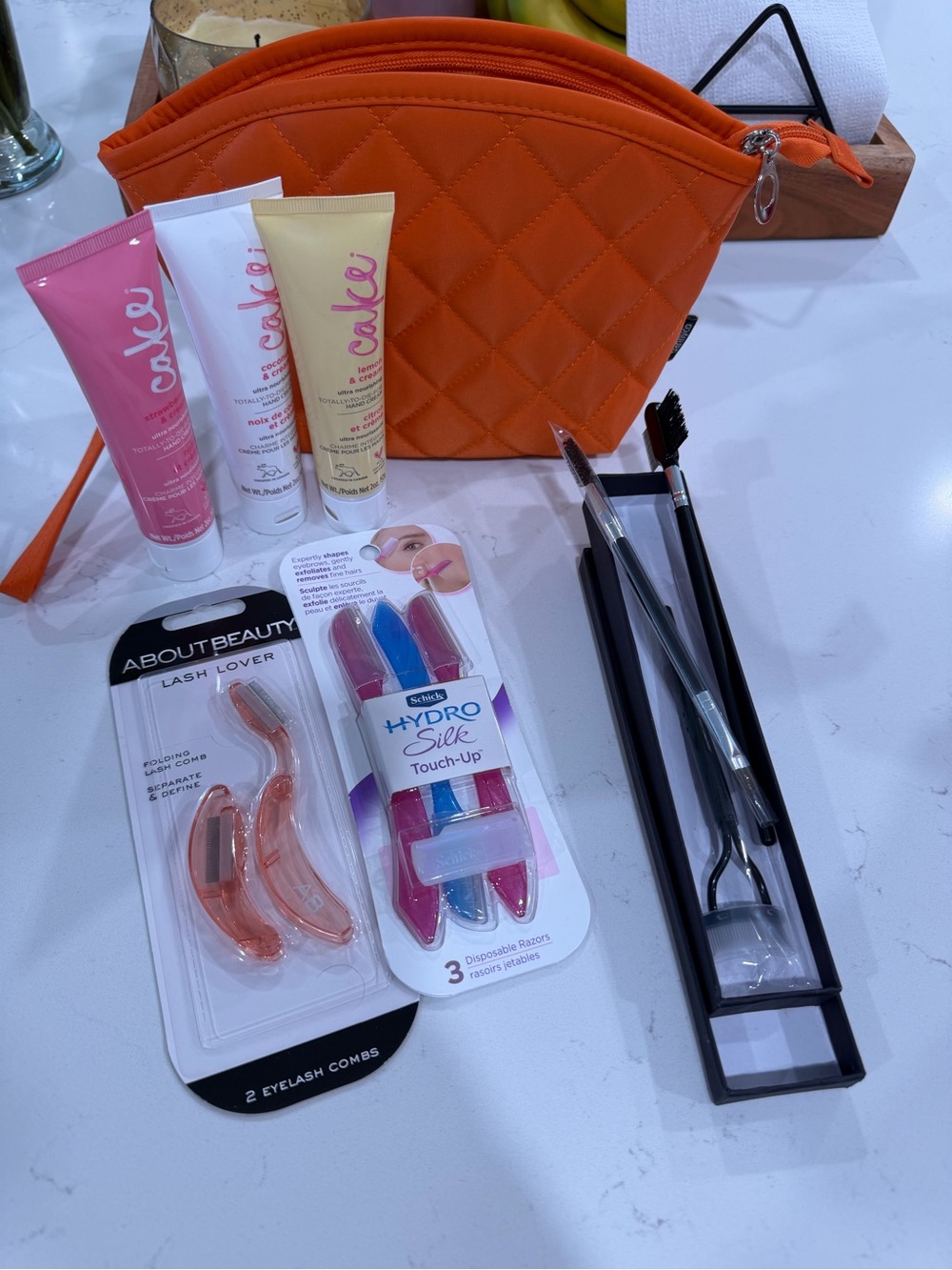 Makeup case, eyebrow & lash tools & cake creams